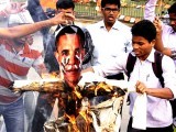 ABVP activists burn an effigy of US President, Barack Obama during a protest against Devyani Khobragade's arrest. PHOTO: REUTERS 